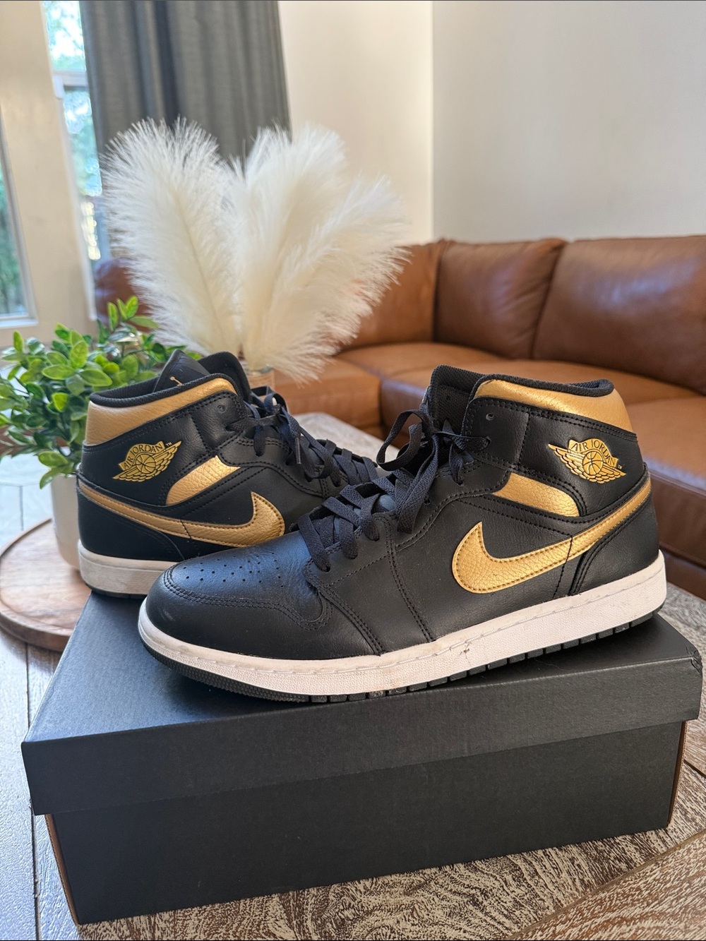 Nike Black and Gold High-Top Sneakers